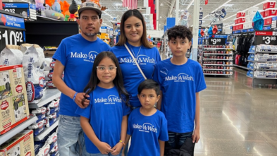 Axel and his family at his shopping spree wish