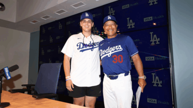 Braxton and the Dodger's business manager standing together