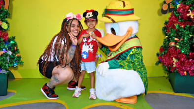 Xyla and mom with Donald Duck