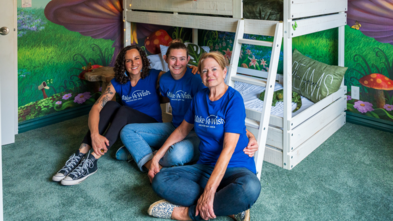 Interior designer and Make-A-Wish Greater Bay Area volunteer Jan Whittingham in wish kid Kyra's new room.