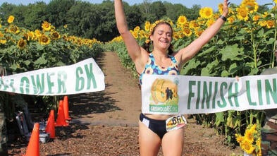 Sunflower 6k runner at finish line