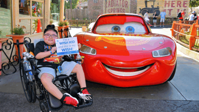 Liam next to Lightning McQueen