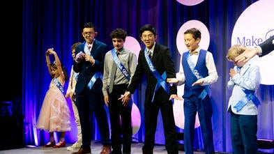 Wish kids celebrate on stage at Wish Ball