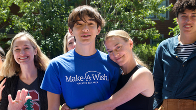 Jonathan and mom, Regina, at wish celebration 