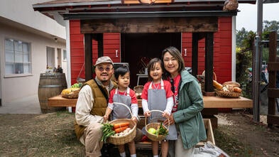 Wish kid Florence with her farm stand
