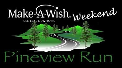 Pineview Make-A-Wish Weekend black background with pine trees and white letters