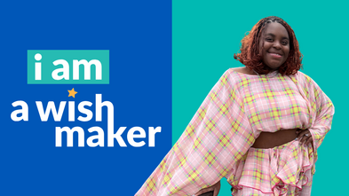 Bee in a pink dress posing for the camera