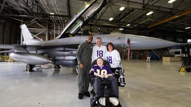 Nash and his parents with Justin Jefferson