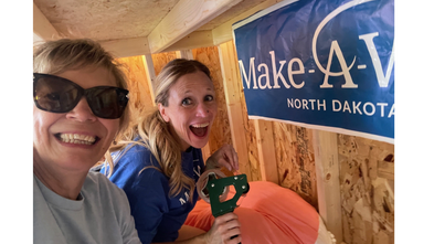 Volunteers Dawn and Tara at a wish reveal. 