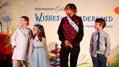 Wish Kids stand on stage at the 2026 Wishmaker's Gala in Wilmington NC.