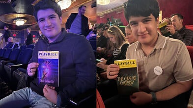 Vincent holding a playbill