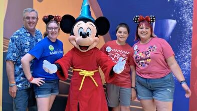 Wish kid Megan and her family at Disney