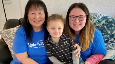Volunteer Teresa with wish kid and daughter