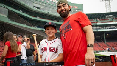 Wish kid Matthew with Red Sox player Connor Wong