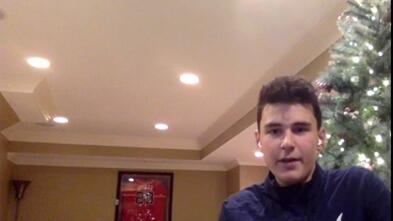 Braydon sits in front of his Christmas tree as he discusses his Make-A-Wish fundraiser