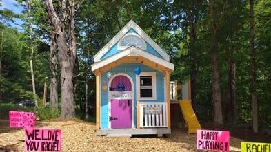 Rachel's new playhouse is decorated for her wish day.