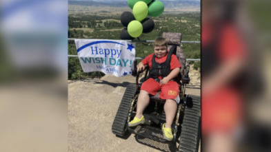 Wish kid Thomas in his new Action Trackchair