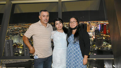 Ashley and her family enjoying their dinner with a view at Top of the World.
