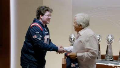 Ben shaking Robert Kraft's hand.