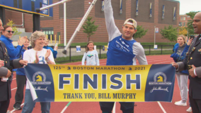 Bill Murphy crosses the finish line