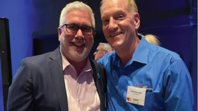 TLC Painting owner John Mulvaney (right) posing with Sean Holleran, CEO of Make-A-Wish MA & RI
