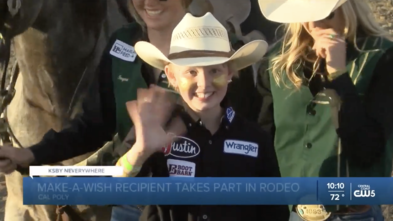 Wish Kid Maddie in her barrel racer attire waves at the camera