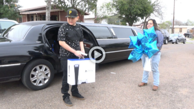 Nestor in front of his limousine, holding his brand new PS5