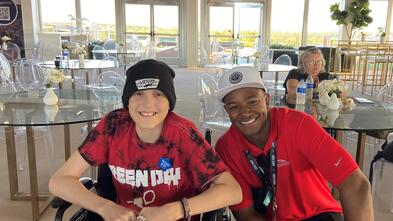 Wish kid and COTA employee