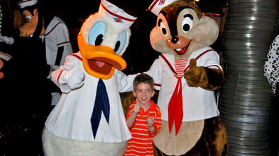 Wish kid Sam at age 5 with Donald Duck and Chip