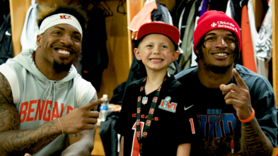 Ja'Marr Chase, wish kid Brixton, and Trayveon Williams smiling