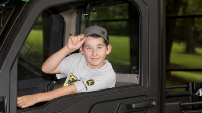 Westyn, 12, teaches others to skid steer with John Deere