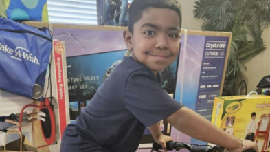 Abraham rides in style with his very own kid-sized motorcycle