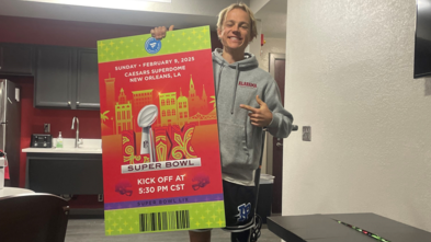 Carson with his ticket to the Superbowl