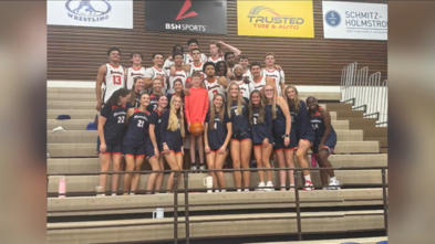 Finley and the University of Mary men's basketball team 