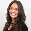 Alexia smiling in a photo