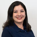 Amy smiling in a photo