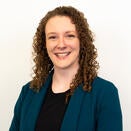Amy smiling in a photo