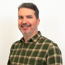 Ryan smiling in a photo