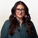 Andrea smiling in a photo