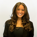 Alexia smiling in a photo