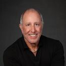 Gary Donovitz smiling and wearing a black shirt