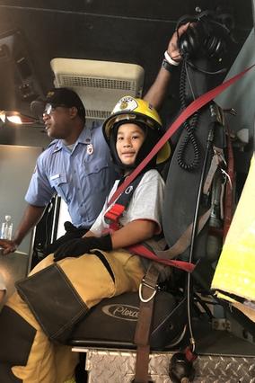 Wish kid Samuel ready for a day on the fire truck