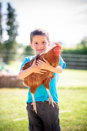 Wish kid Sawyer and a chicken
