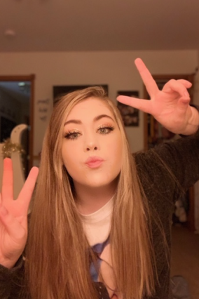 Wish kid Allie poses