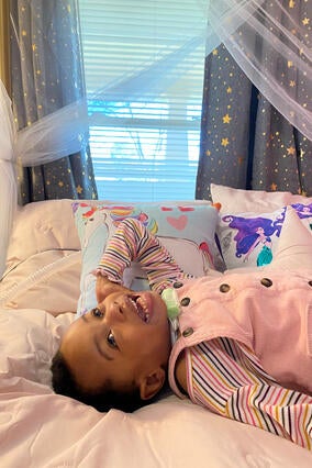 Peyton's wish to have a room makeover, laying on bed