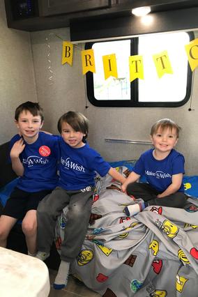 Britton and his brothers enjoy the camper.