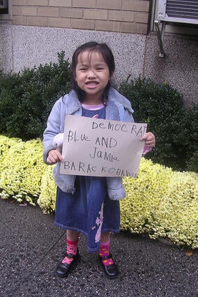 Young Wish Kid Jamie with Sign