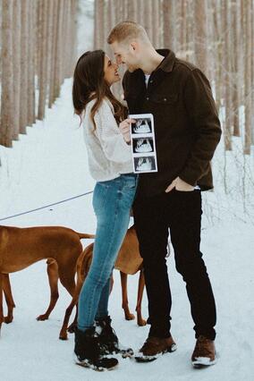 Wish Alum Brittney with husband and ultrasound