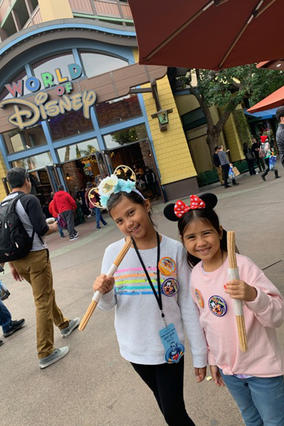 Chazlyn and her sister at Disneyland