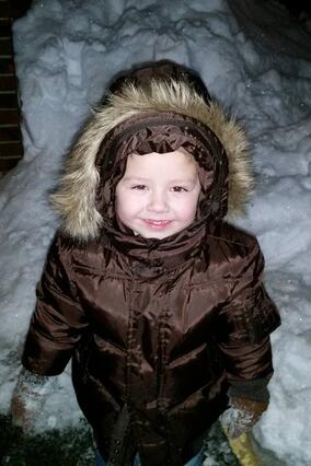 Zac smiling in the snow
